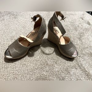 Guess gold wedges size 7